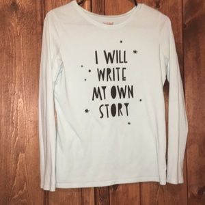 Teal long sleeve shirt.